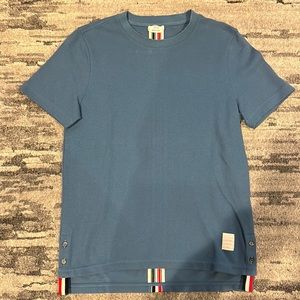 Thom Browne men’s blue pique t-shirt with RWB stripe on the back size 0